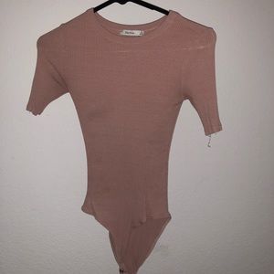 Light pink body suit